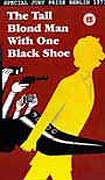 The Tall Blond Man With One Black Shoe